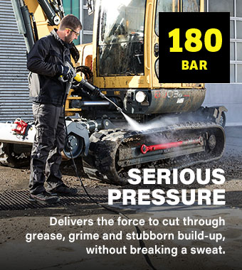 Kärcher HD 7/12-4 M PLUS 180 Bar Professional Pressure Washer – Heavy-Duty Job Site Cleaning Kärcher HD 7/12-4 M PLUS 180 bar professional pressure washer cleaning heavy construction equipment on a job site