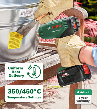 Bosch EasyHeat 18V-500 18V Cordless Heat Gun – Uniform Heat Delivery, Boost Mode, 350/450°C, 3 Year Warranty Bosch EasyHeat 18V-500 18V cordless heat gun in use – uniform heat delivery, 350/450°C settings, boost mode, heat coil technology, 3 year MyBosch warranty
