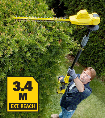 EXTENDED REACH: Up to 3.4m extended
reach to cut hard to reach hedges with
your feet still firmly onthe ground. EXTENDED REACH: Up to 3.4m extended reach to cut hard to reach hedges with your feet still firmly onthe ground