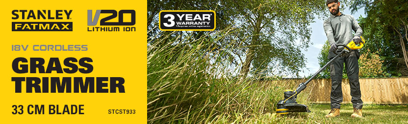 Man using Stanley FatMax V20 STCST933 18V cordless grass trimmer with 33cm blade in garden
