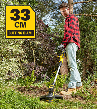 Stanley FatMax V20 SFMCST933 – 33cm Cutting Diameter Grass Trimmer Stanley FatMax V20 SFMCST933 18V cordless grass trimmer with telescopic shaft being used to trim overgrown grass along a garden border